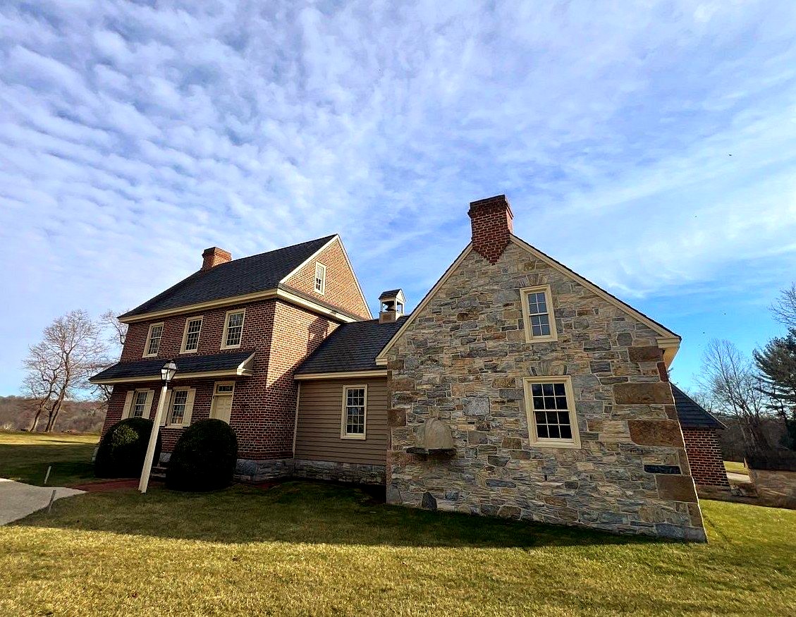 Picture of completed roofing job with Asphalt Shingles